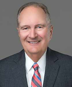 Hon. James L. Stoelker (Ret.)